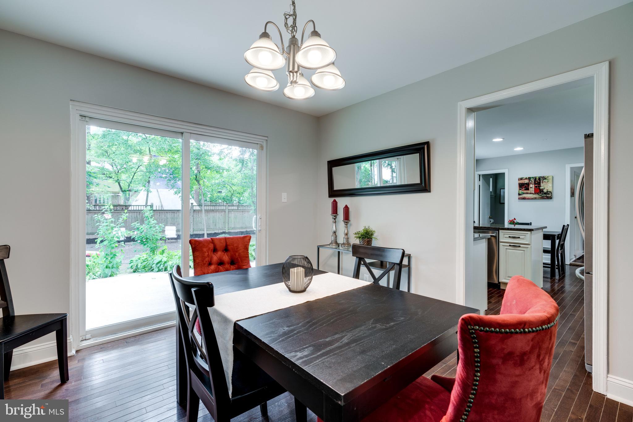 8430 Thames Street Springfield, VA 22151 - Photo 6 of 29 Separate Dining Room with Door Leading to Patio