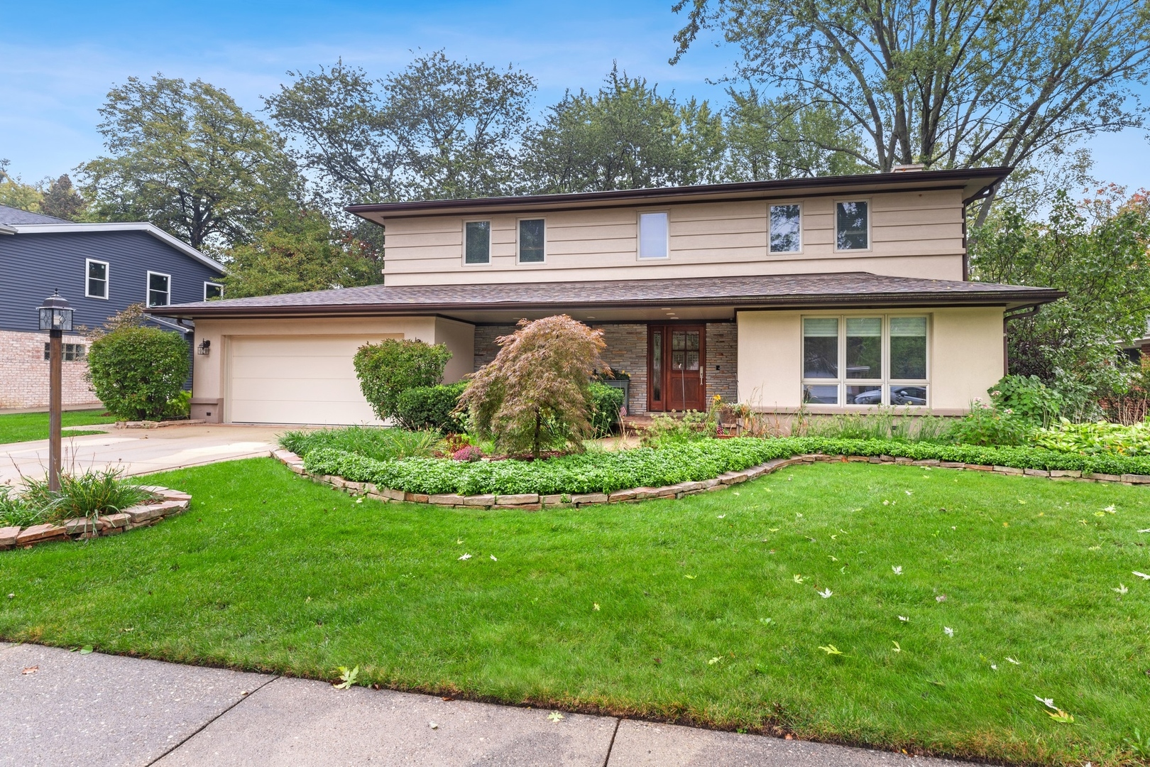 2037 Clover Road Northbrook, IL 60062 - Photo 1 of 29 a view of a house with a yard