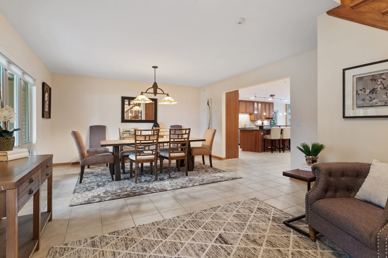 2037 Clover Road Northbrook, IL 60062 - Photo 7 of 29 a living room with furniture and a dining table