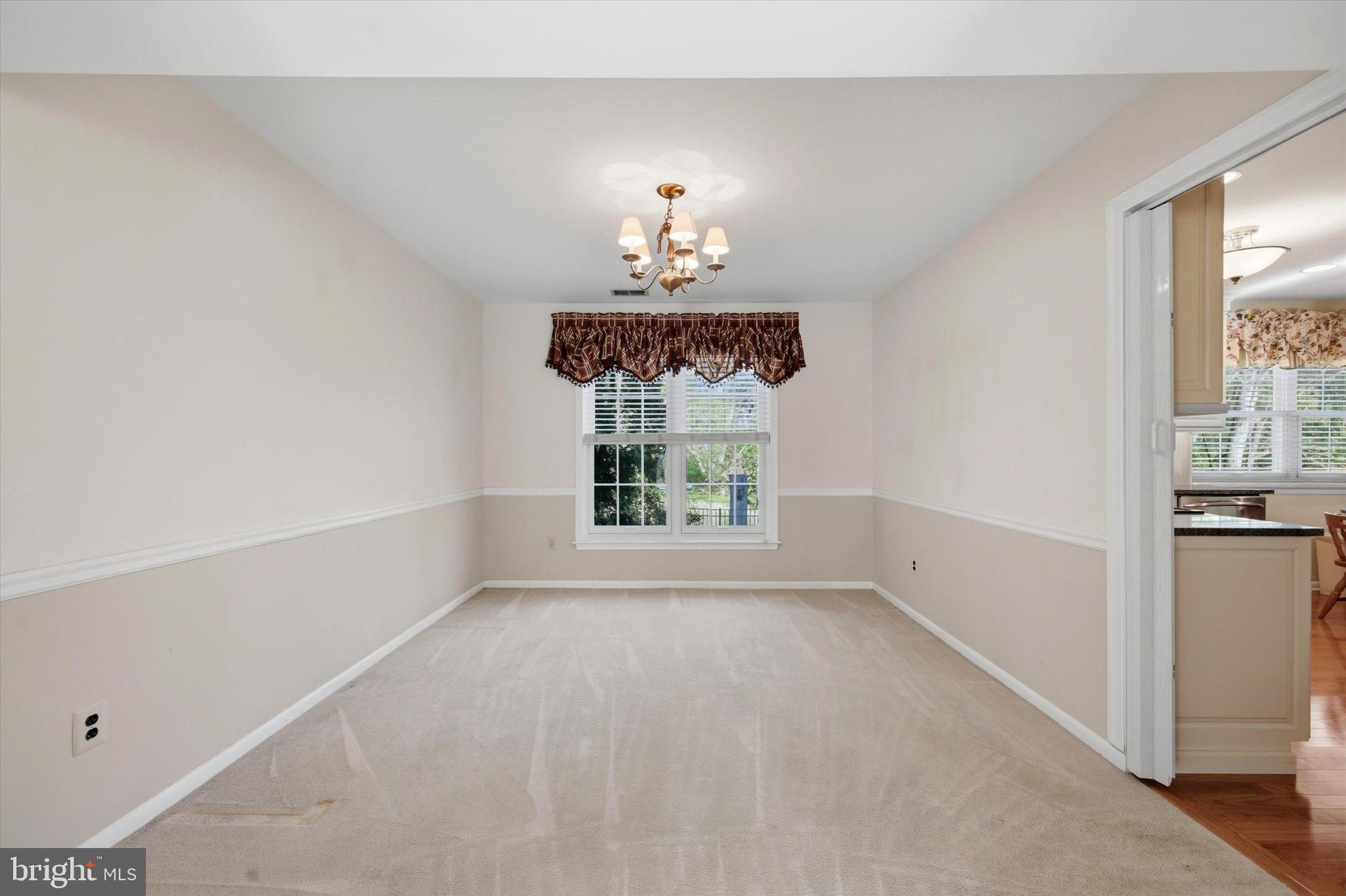1965 Foster Road Hatfield, PA 19440 - Photo 12 of 38 a room with a window and a chandelier