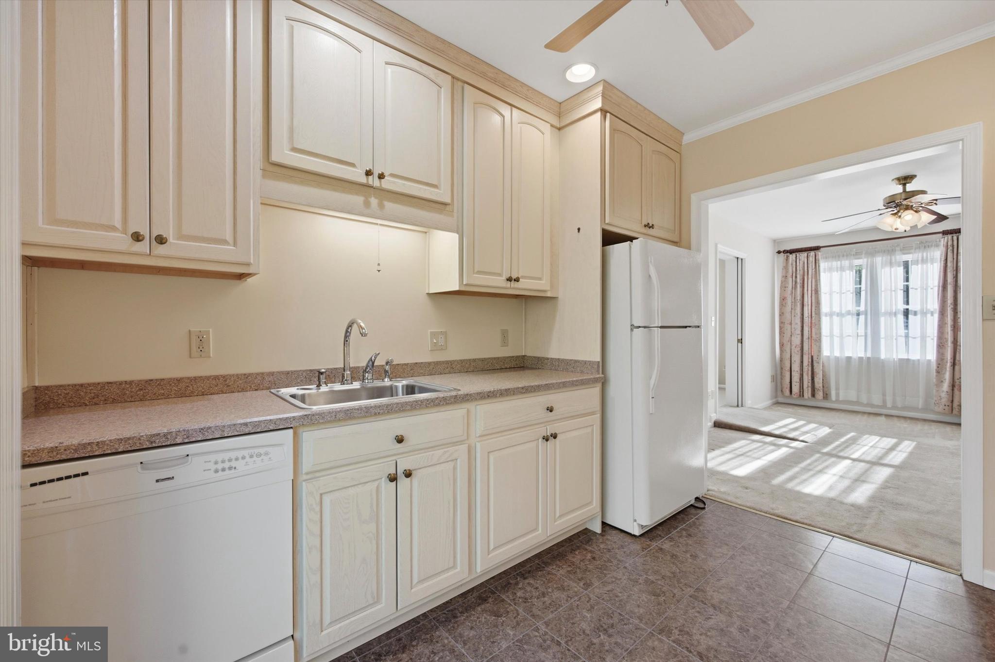 1965 Foster Road Hatfield, PA 19440 - Photo 19 of 38 a kitchen with granite countertop white cabinets and stainless steel appliances