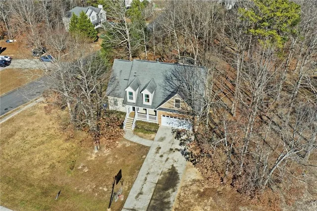 a picture of a park with a white bed