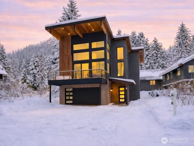 a front view of a house with parking