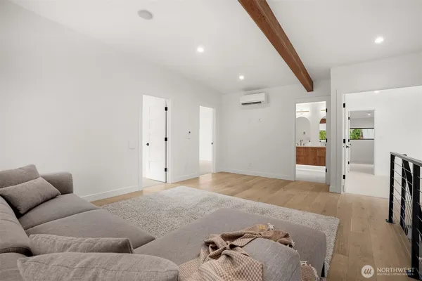 a bedroom with furniture and a couch