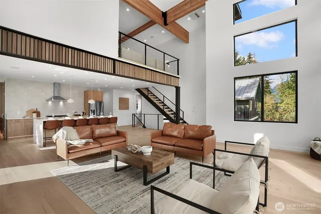 a living room with furniture and a rug