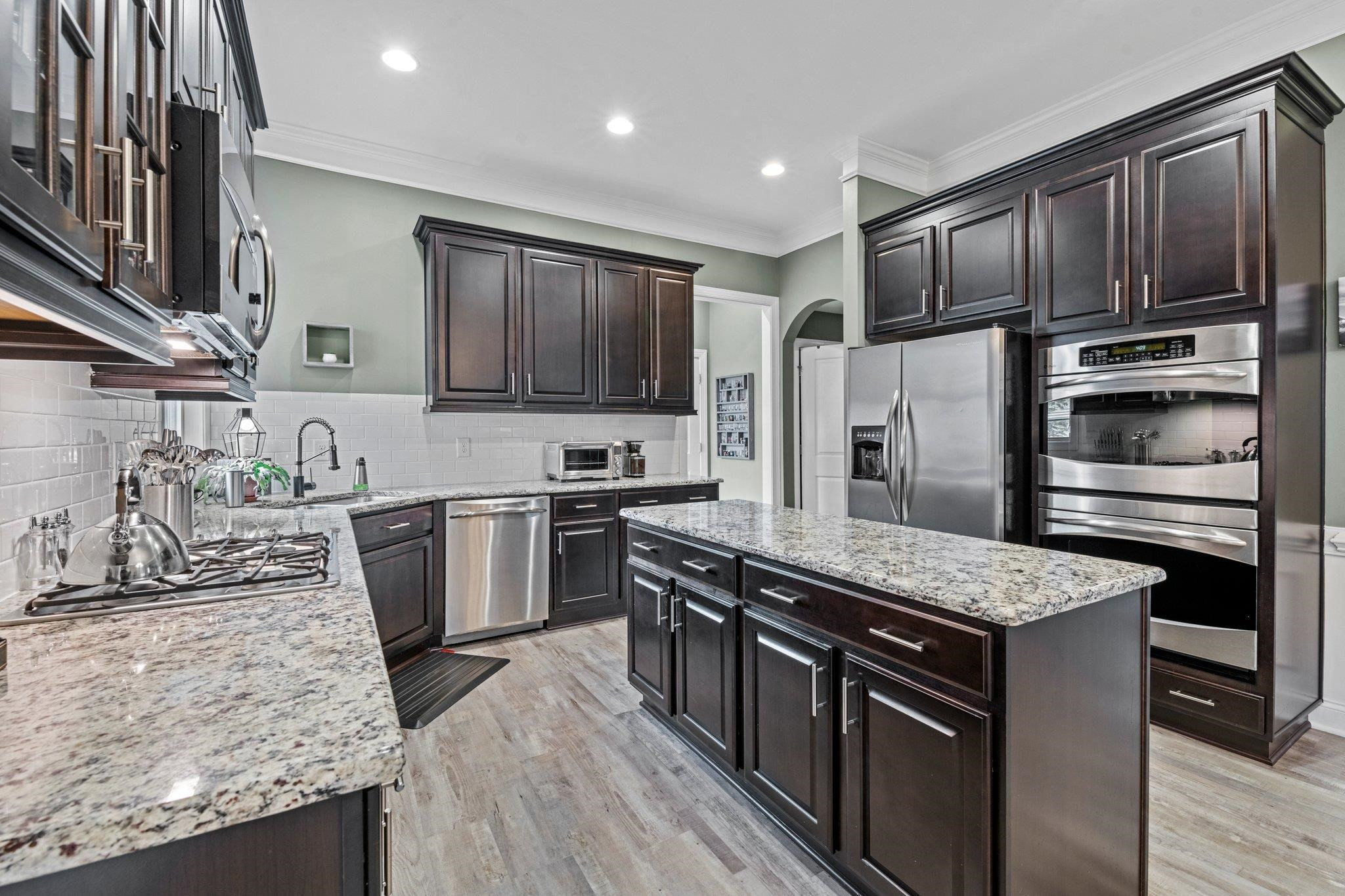 1545 Fullerton Place Raleigh, NC 27607 - Photo 11 of 45 Double wall ovens, top oven is convection. Beautiful space to entertain or cook for the family. Kitchen
