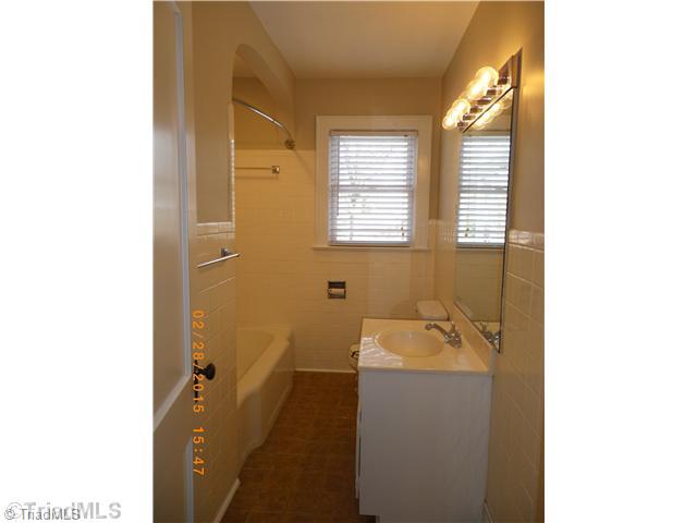 3372 Country Club Road Winston-Salem, NC 27104 - Photo 12 of 16 Bath. Hallway bath with tile floor.