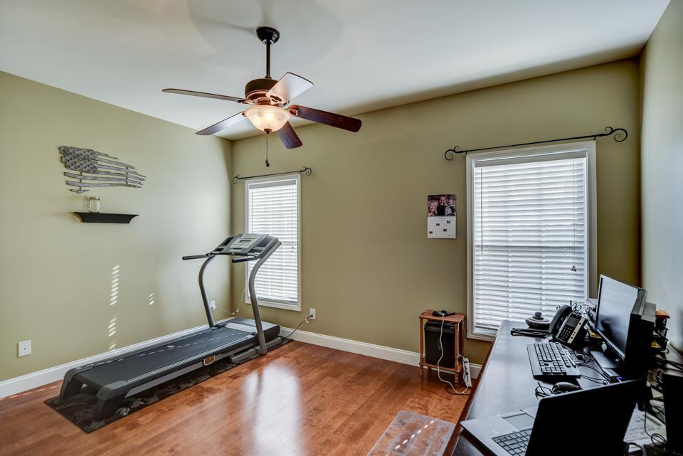 323 North Centerpoint Road Portland, TN 37148 - Photo 23 of 30 a room with gym equipment and windows