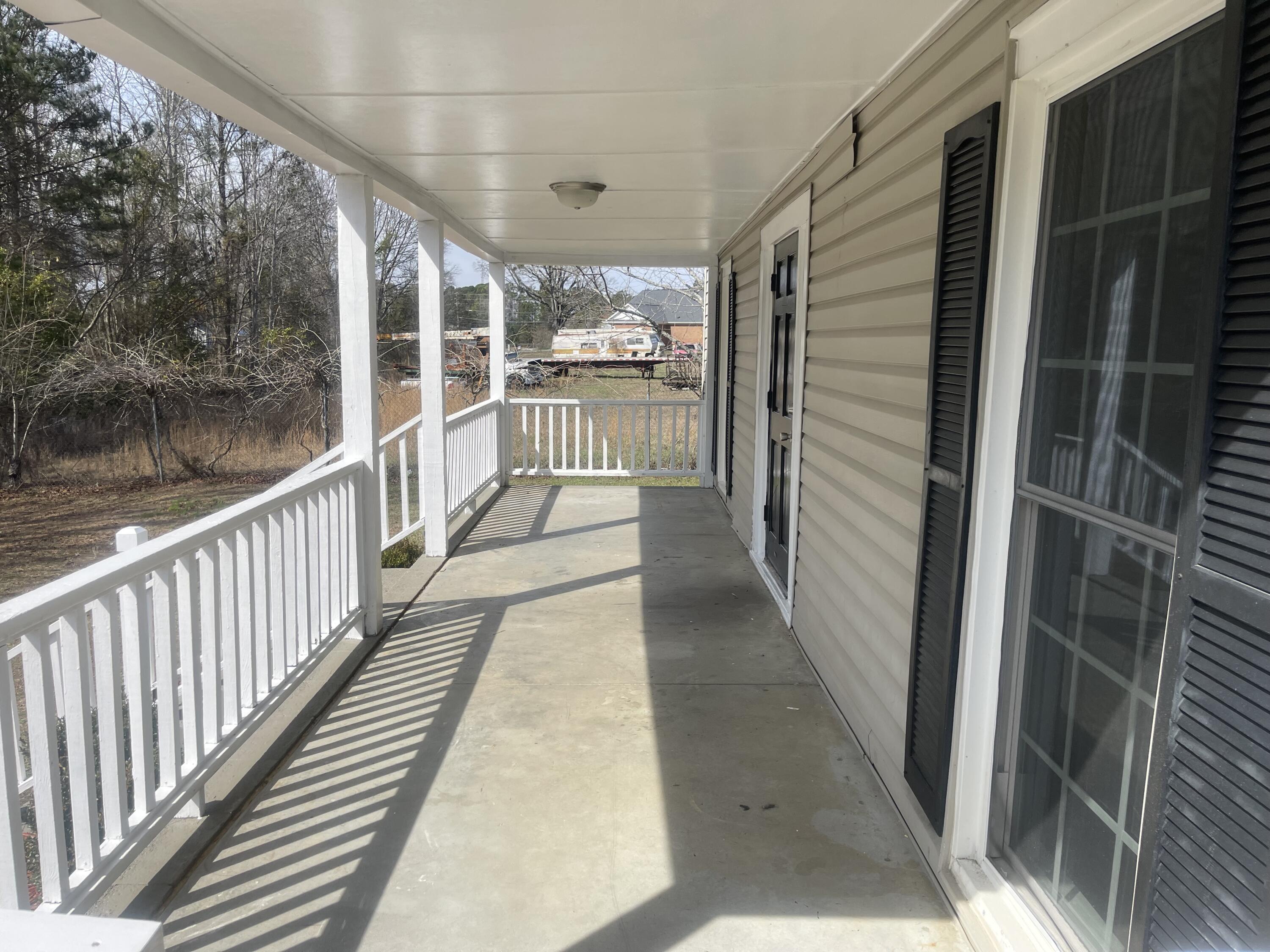 426 Salem Road Thomson, GA 30824 - Photo 2 of 22 Rocking chair front porch