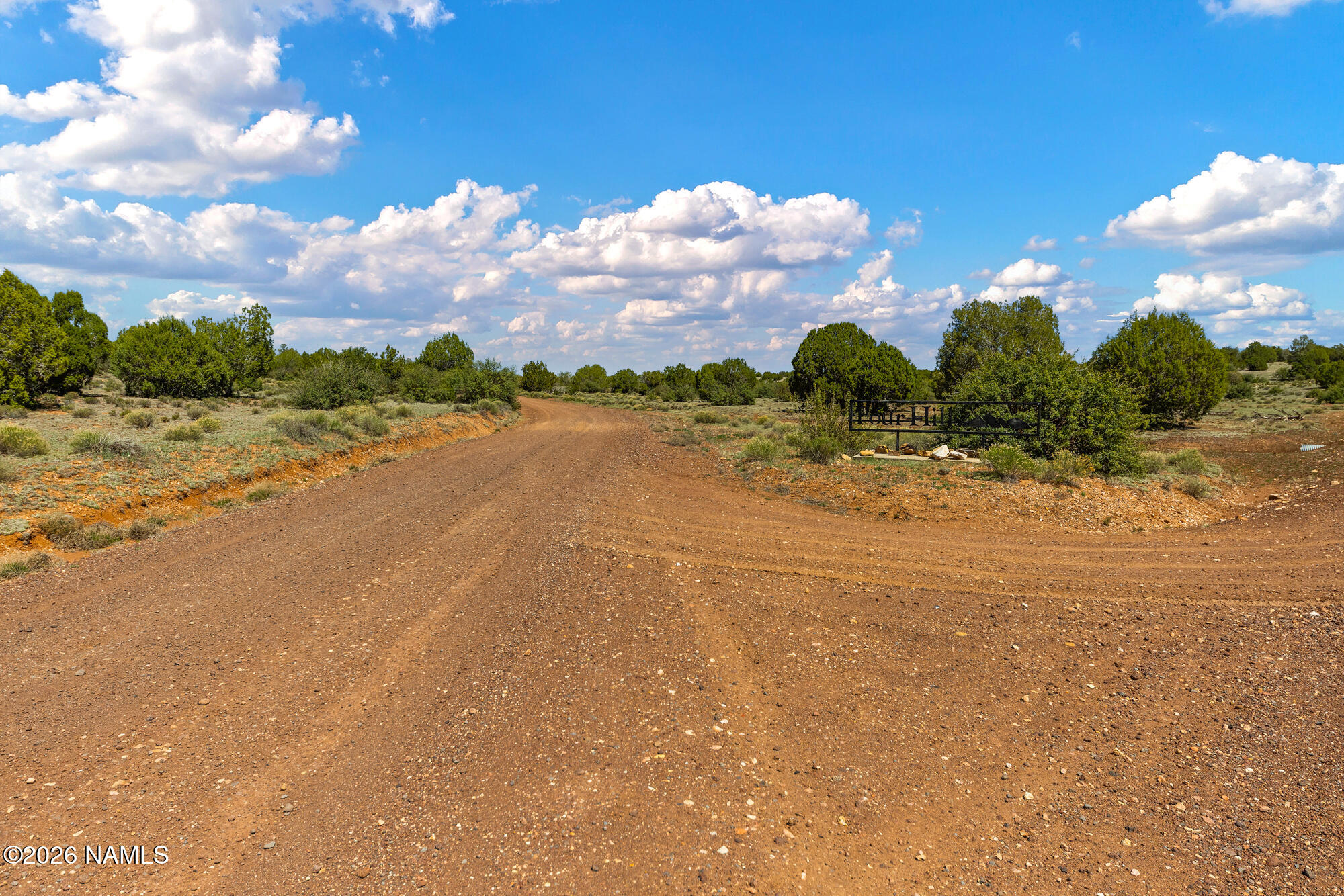 10529 West Red Bluff Road Williams, AZ 86046 - Photo 32 of 35 a view of a lake with a city