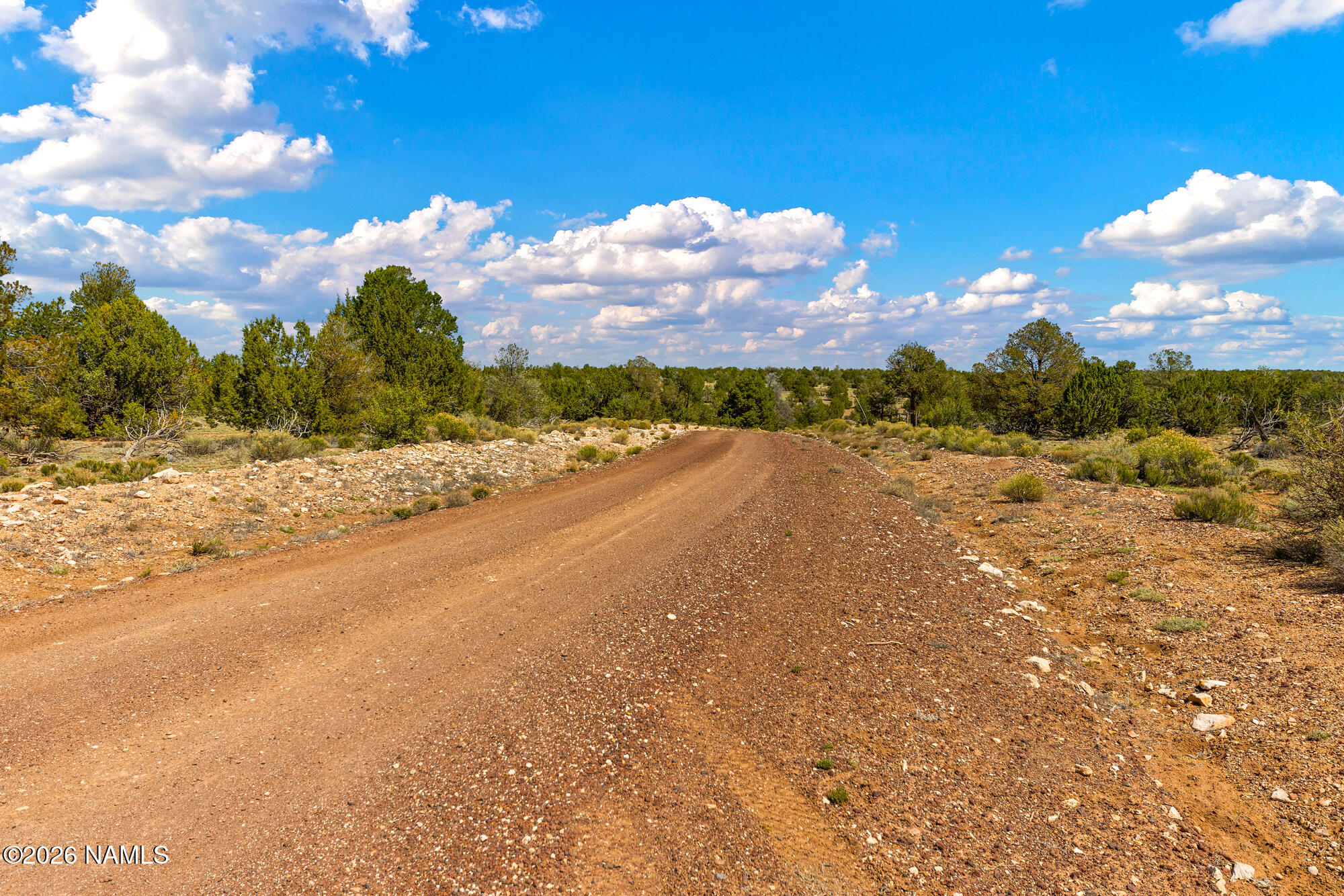 10529 West Red Bluff Road Williams, AZ 86046 - Photo 33 of 35 a view of a street with sunset view