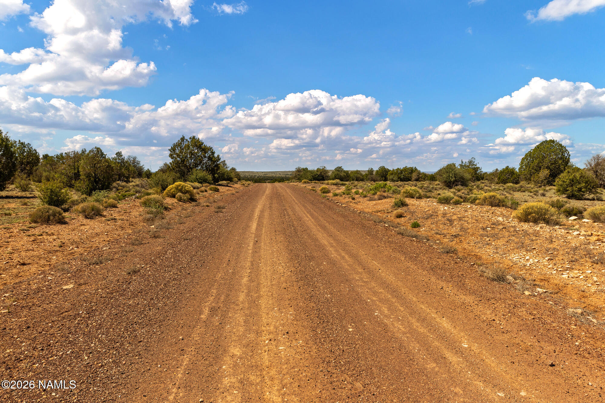10529 West Red Bluff Road Williams, AZ 86046 - Photo 34 of 35 a view of a houses with sky view
