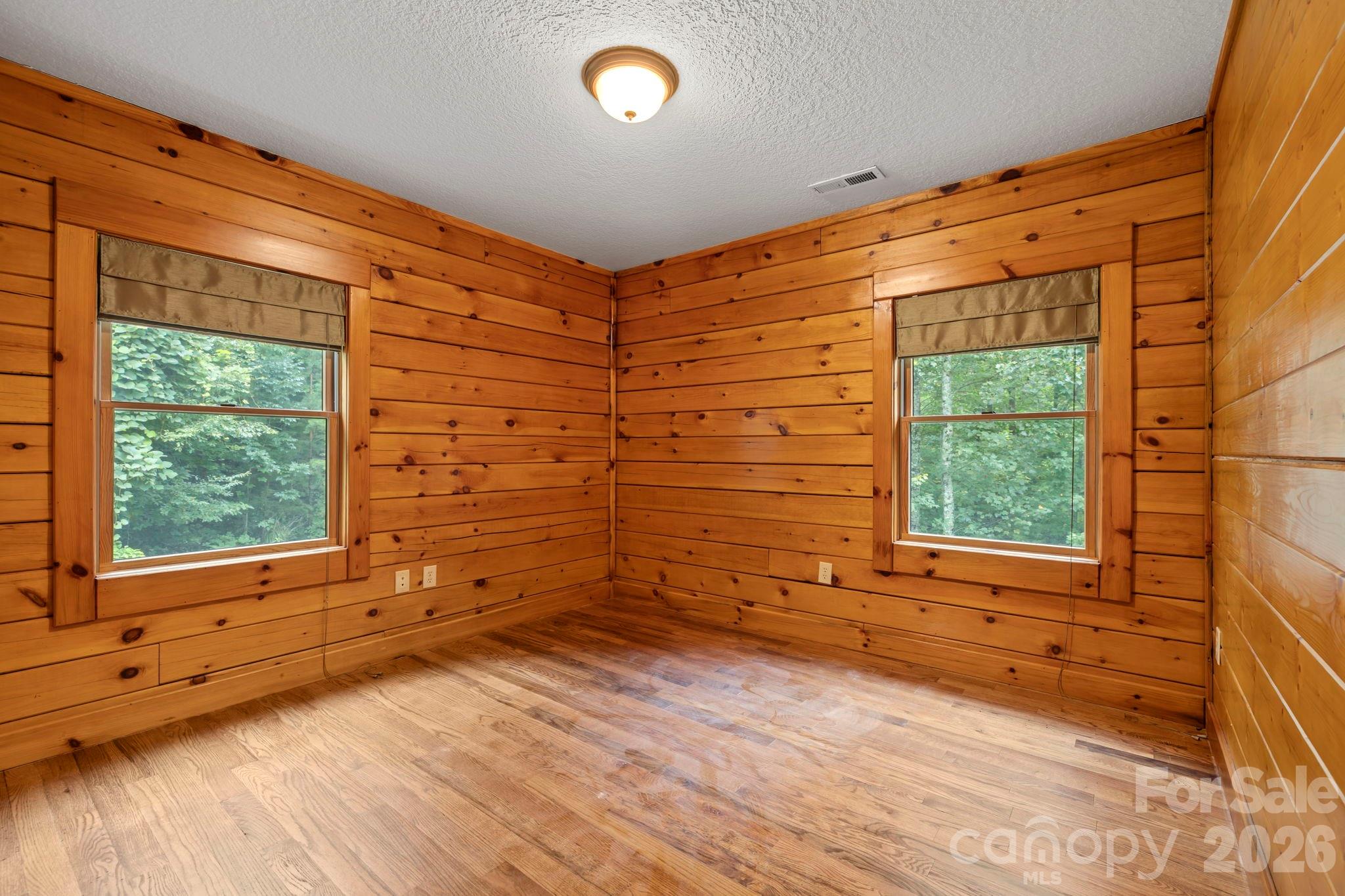 266 Rhododendron Drive Saluda, NC 28773 - Photo 20 of 35 a view of a backyard of a house
