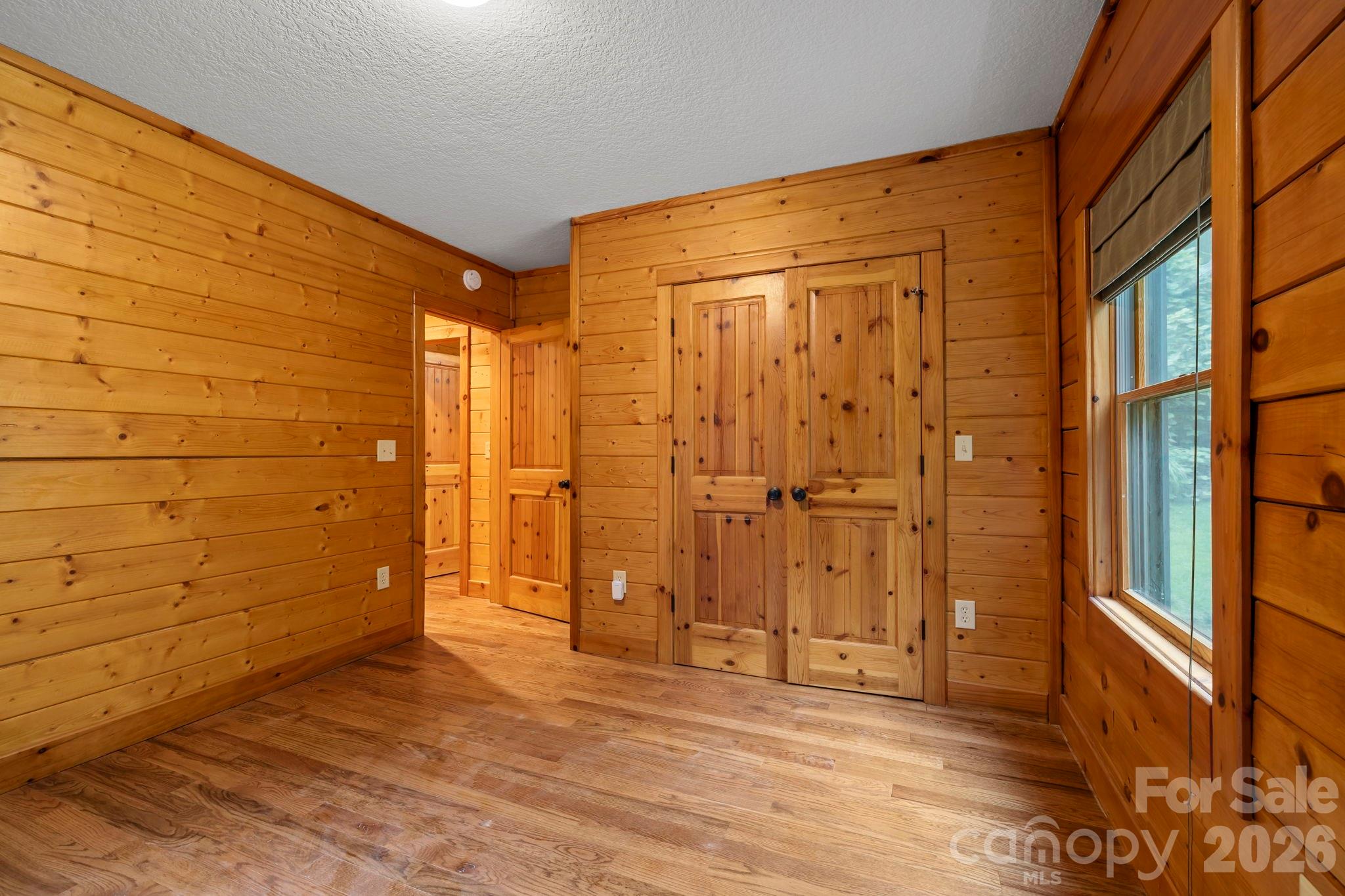 266 Rhododendron Drive Saluda, NC 28773 - Photo 21 of 35 a view of a bathroom with a shower