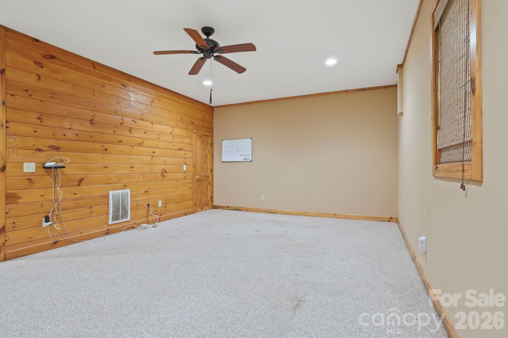 266 Rhododendron Drive Saluda, NC 28773 - Photo 26 of 35 a view of empty room with ceiling fan