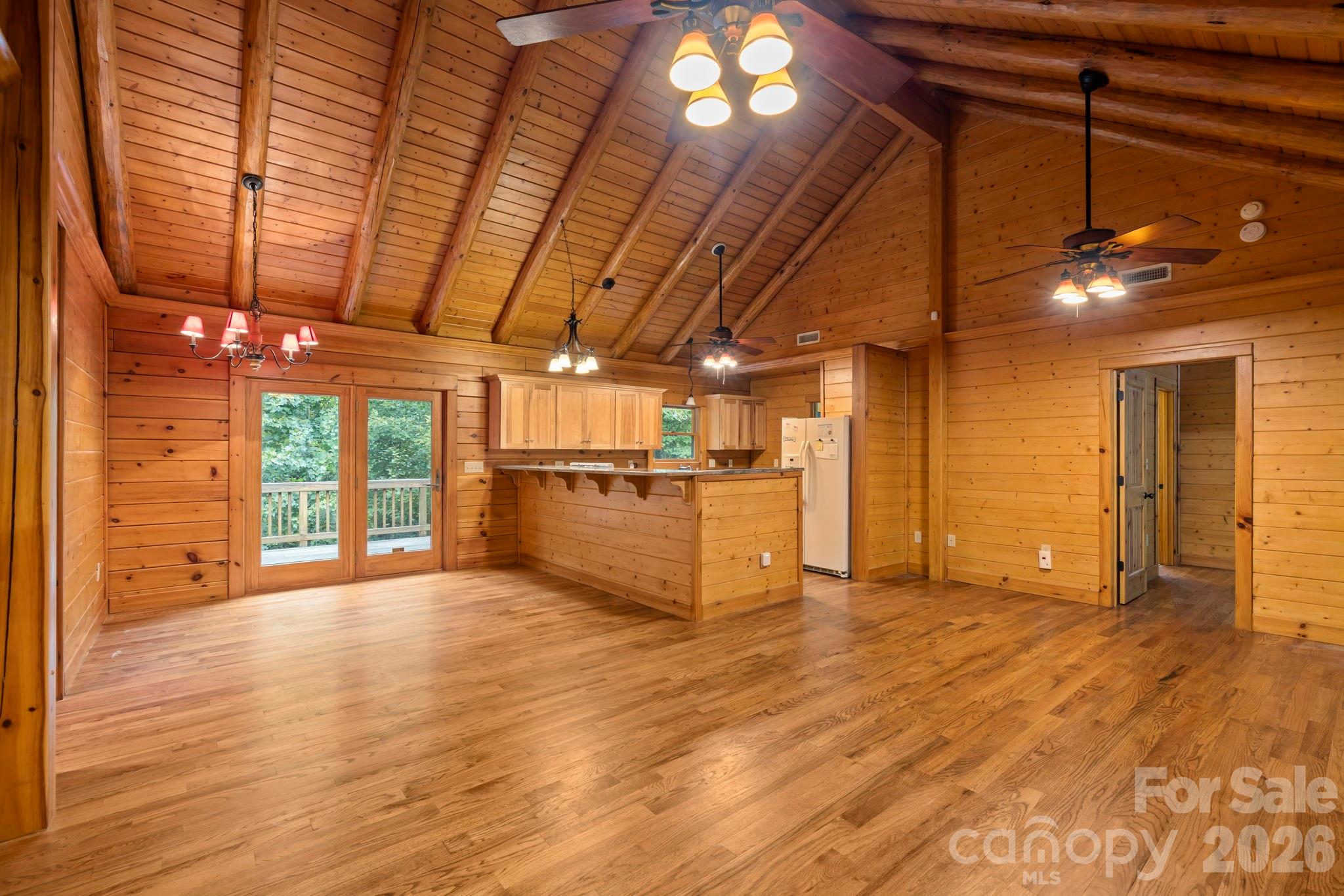 266 Rhododendron Drive Saluda, NC 28773 - Photo 8 of 35 a view of a livingroom with wooden floor
