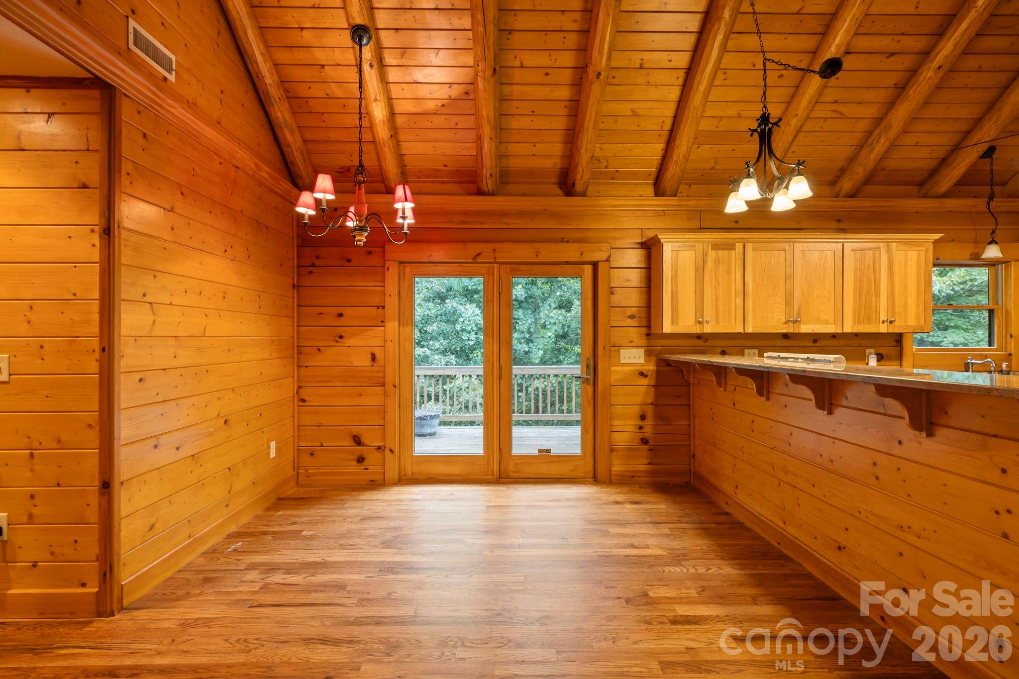 266 Rhododendron Drive Saluda, NC 28773 - Photo 9 of 35 a view of an empty room with a window