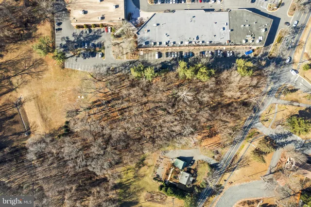 a view of swimming pool yard and outdoor seating