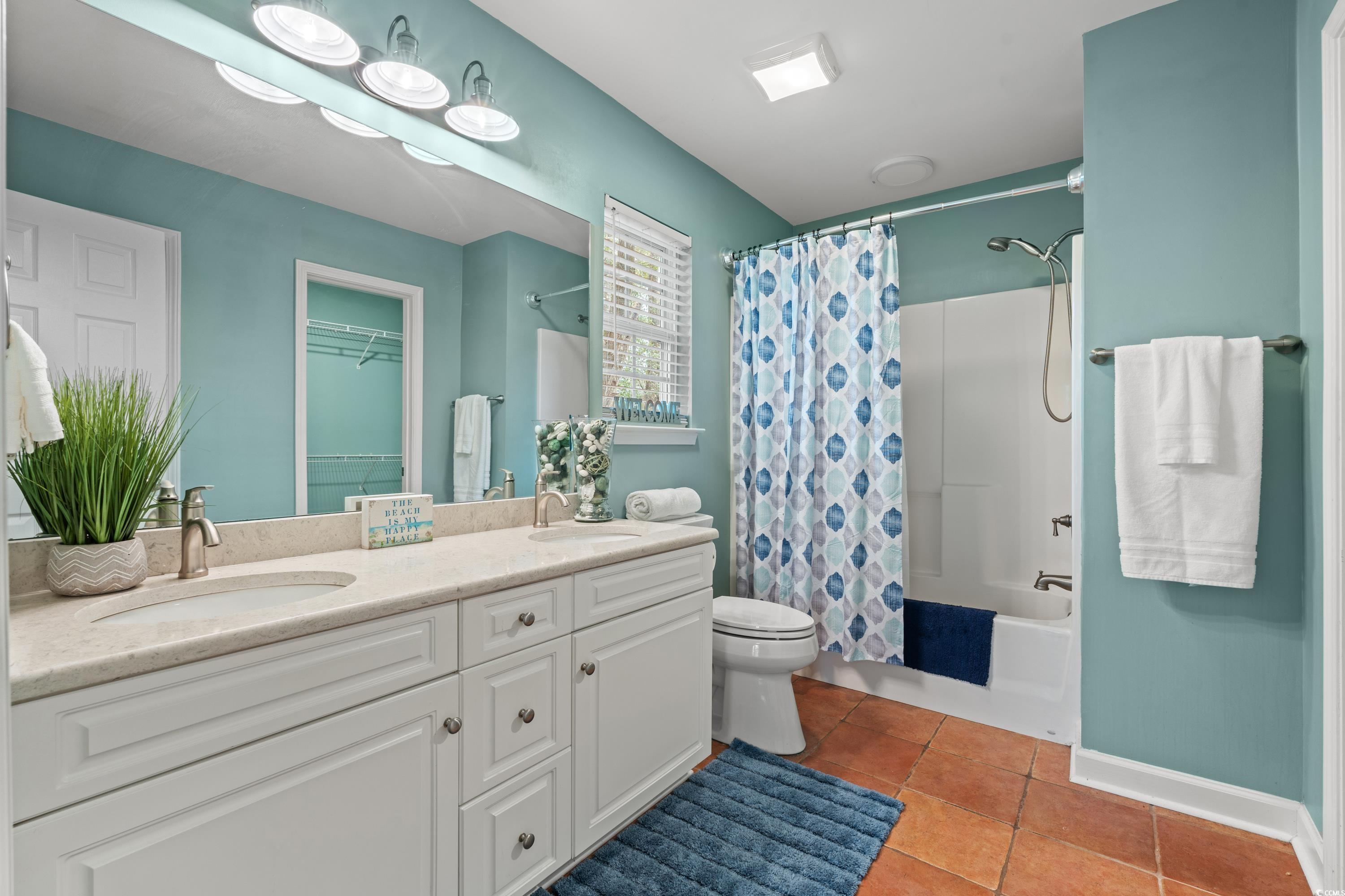177 Reef Run Road Pawleys Island, SC 29585 - Photo 13 of 40 Full bathroom with double vanity, shower / tub com