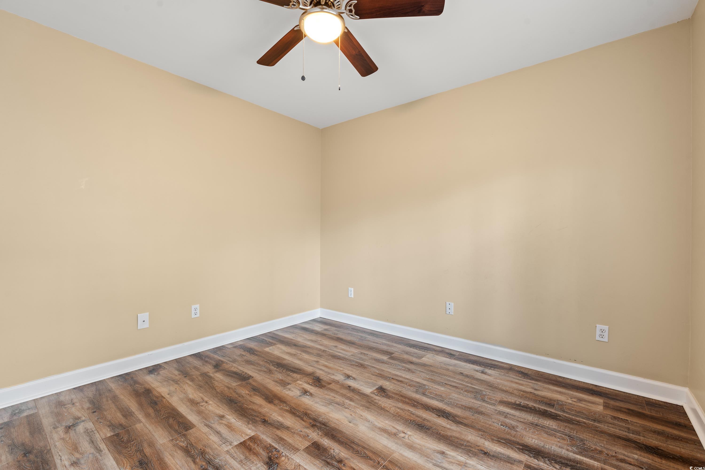177 Reef Run Road Pawleys Island, SC 29585 - Photo 19 of 40 Unfurnished room featuring ceiling fan, baseboards
