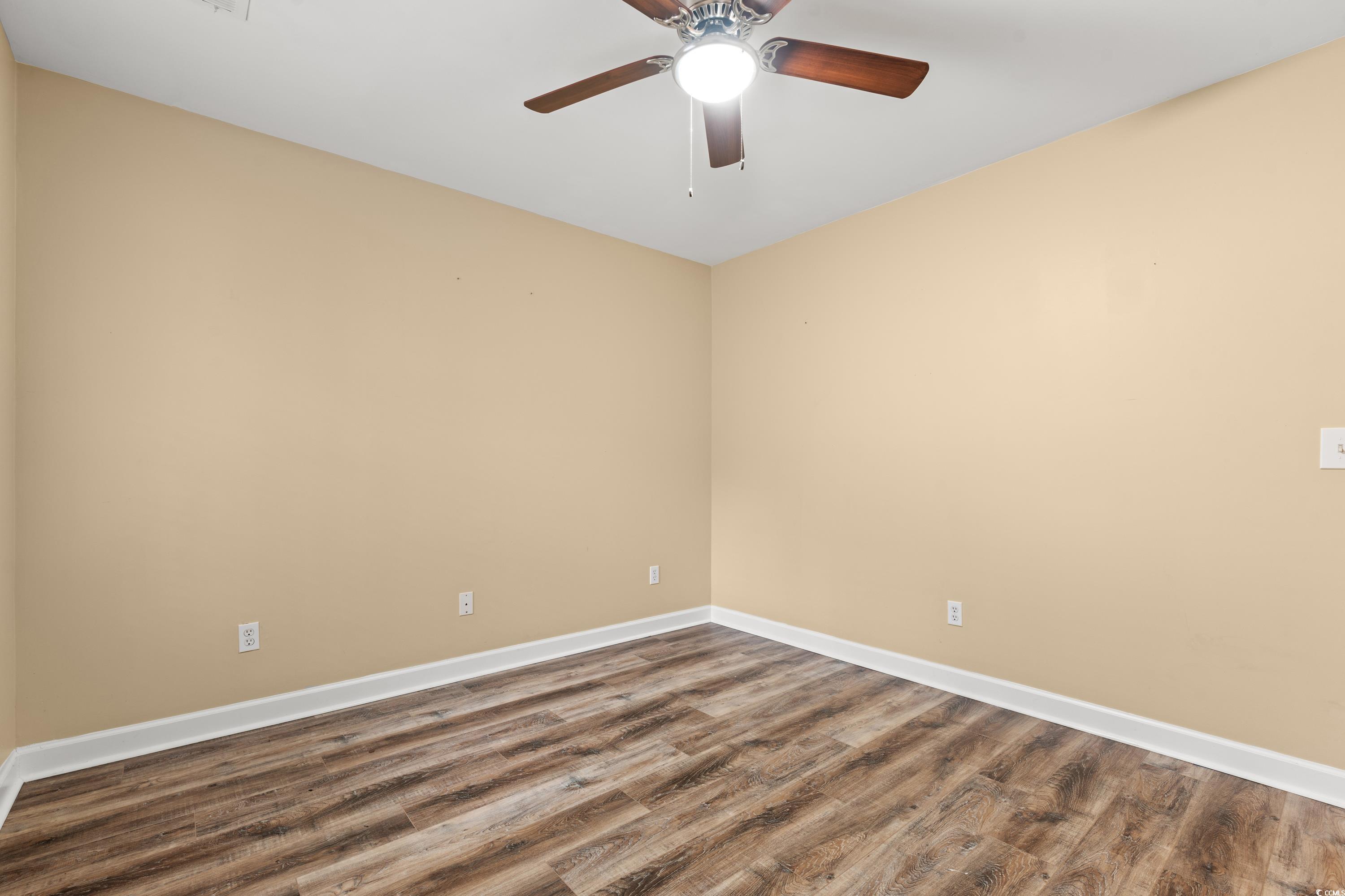 177 Reef Run Road Pawleys Island, SC 29585 - Photo 24 of 40 Spare room with a ceiling fan, baseboards, and woo