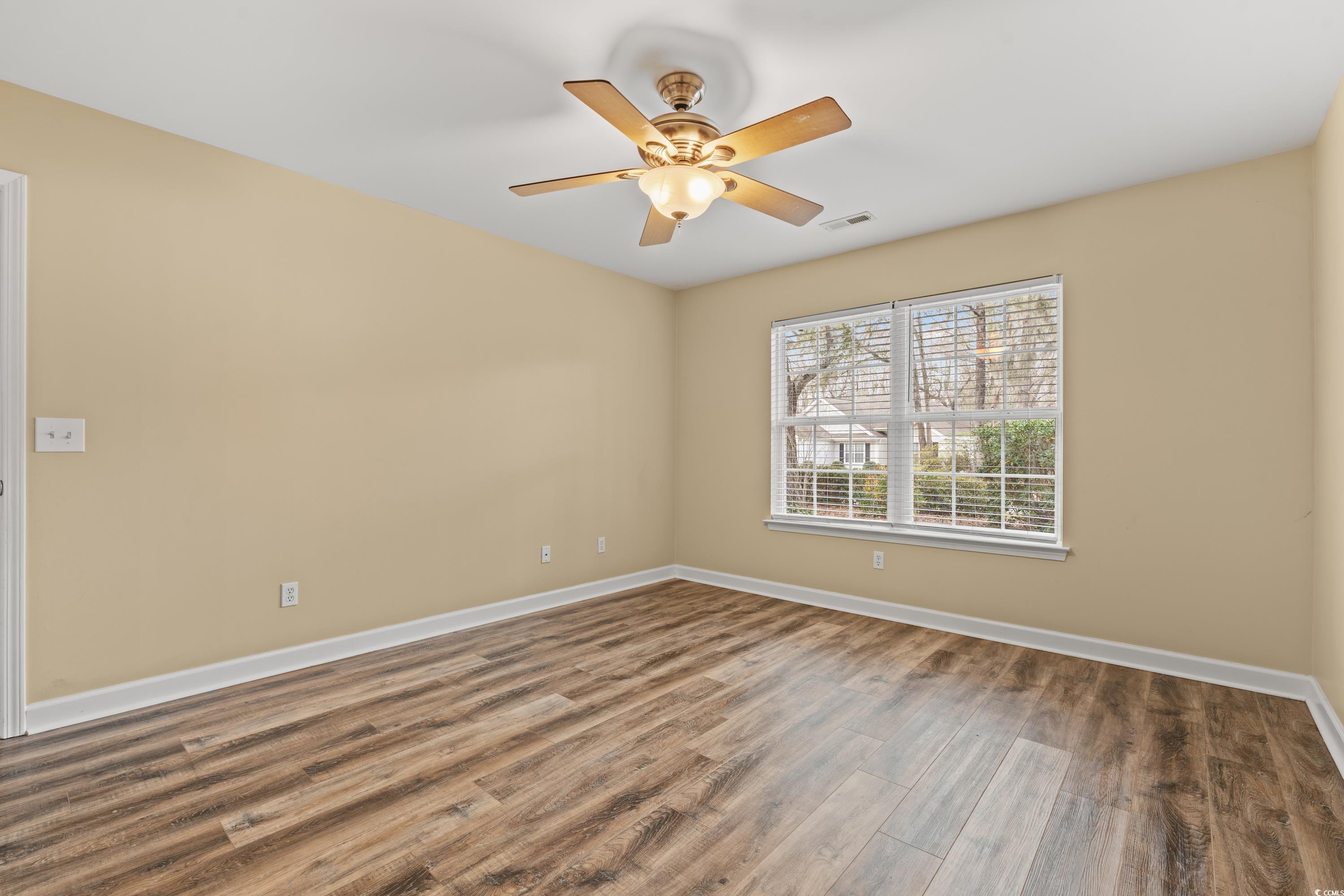 177 Reef Run Road Pawleys Island, SC 29585 - Photo 10 of 40 Unfurnished room with visible vents, ceiling fan,