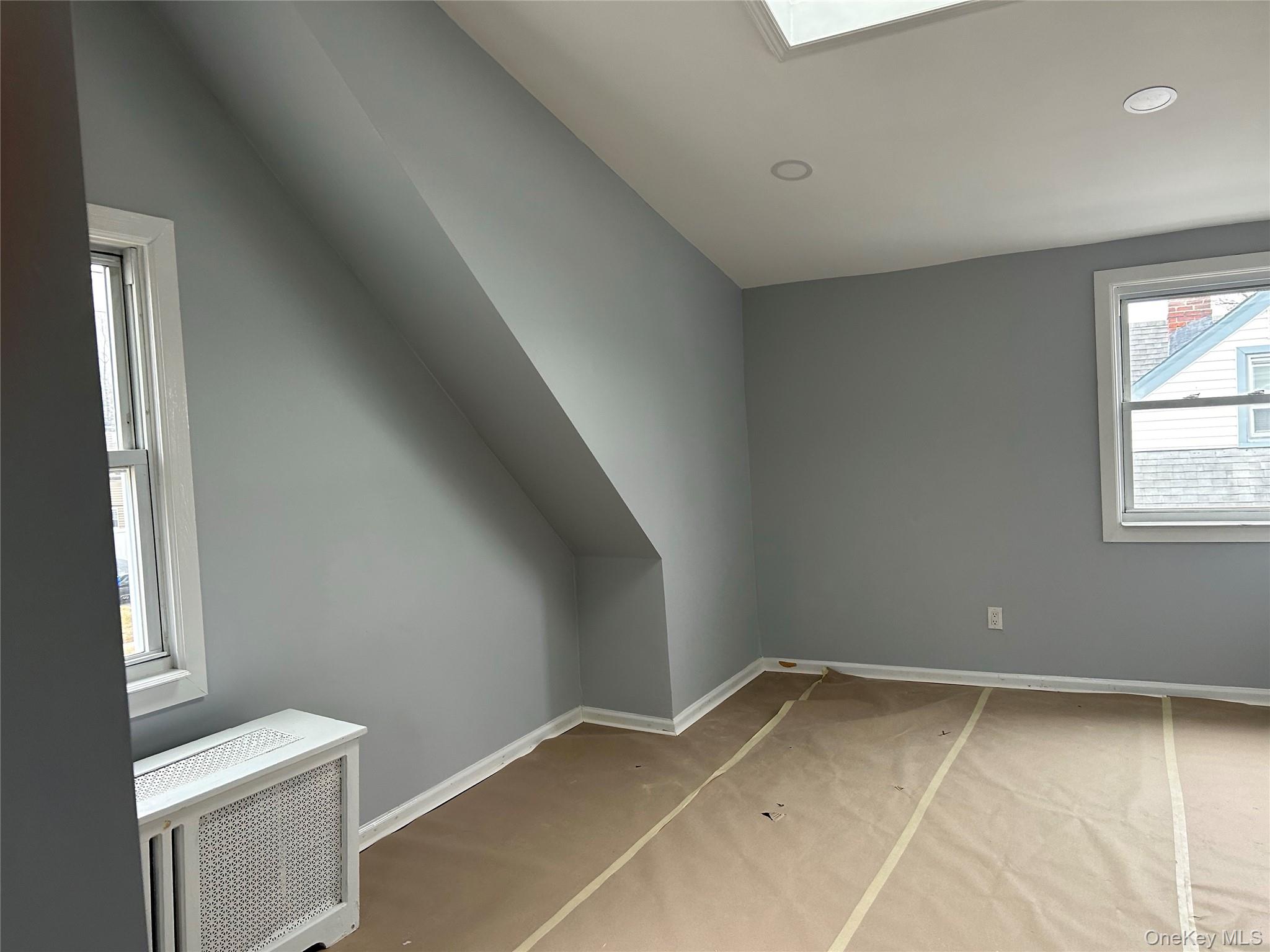 42 Princeton Street Valley Stream, NY 11580 - Photo 13 of 13 Bonus room featuring radiator and baseboards