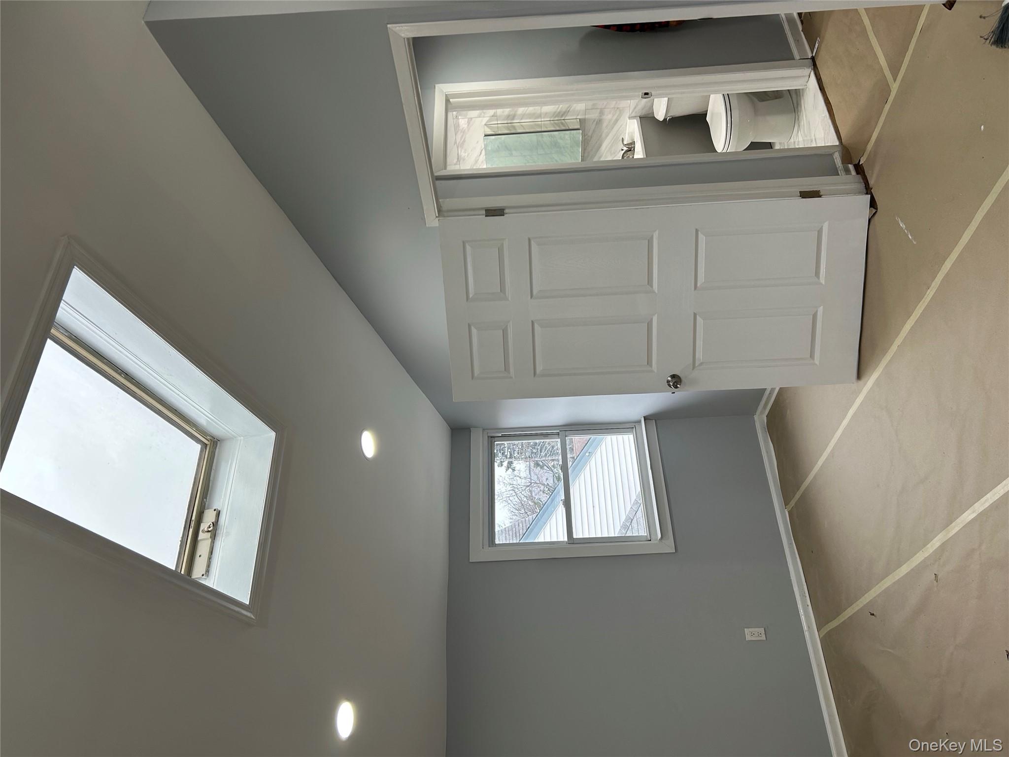 42 Princeton Street Valley Stream, NY 11580 - Photo 6 of 13 Unfurnished bedroom with lofted ceiling, recessed lighting, and a skylight