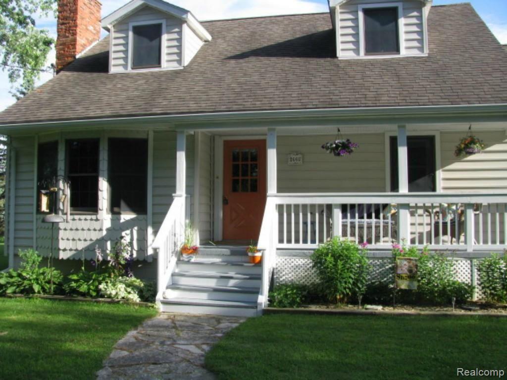 2660 31 Mile Road Washington, MI 48095 - Photo 2 of 50 front view of porch & door