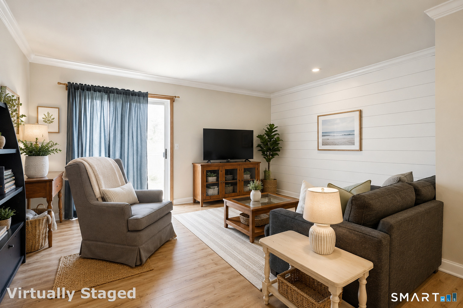155 Short Beach Road, Unit 102 Stratford, CT 06615 - Photo 5 of 15 a living room with furniture and a flat screen tv
