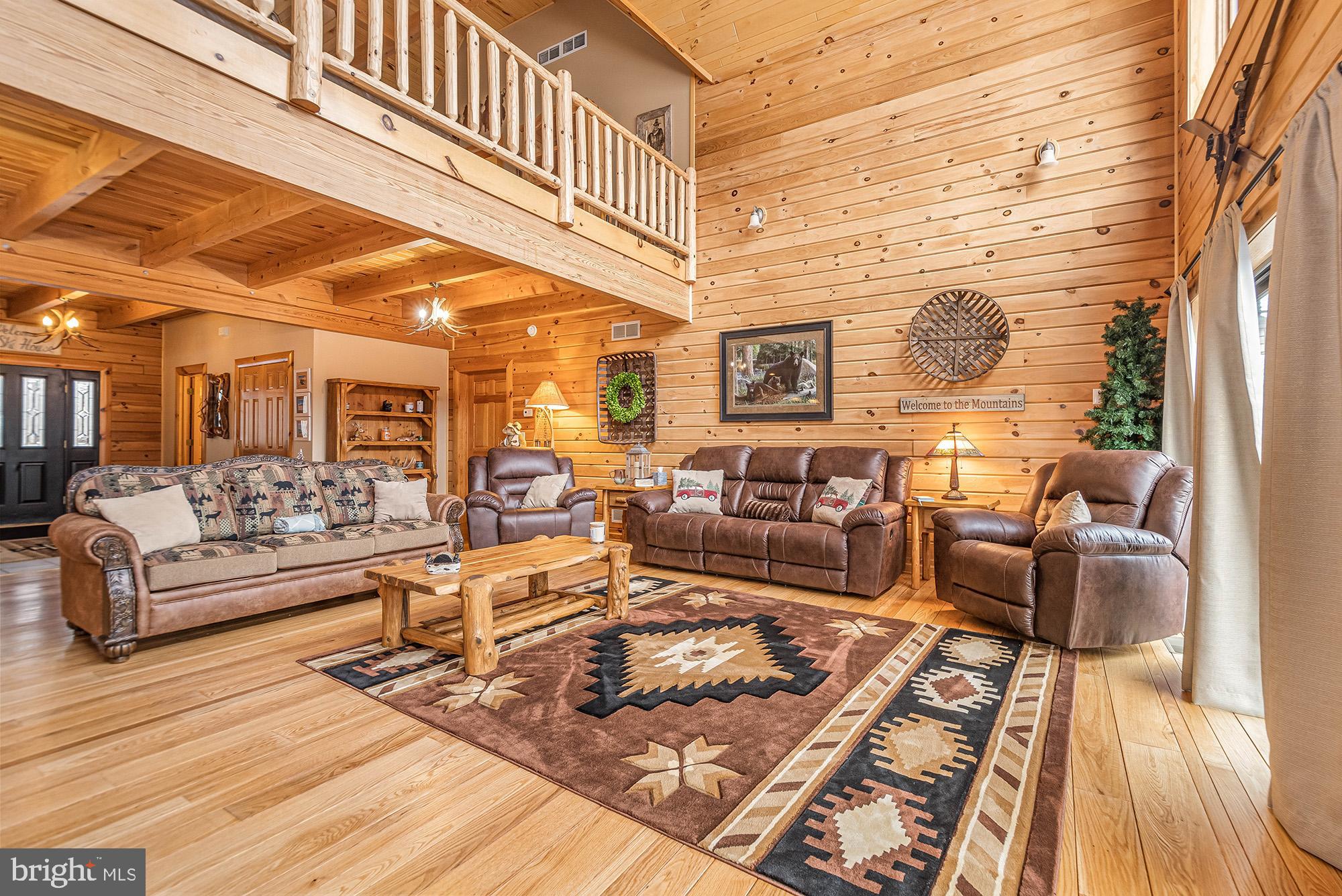 642 Deep Creek Highlands Road McHenry, MD 21541 - Photo 11 of 59 a living room with furniture