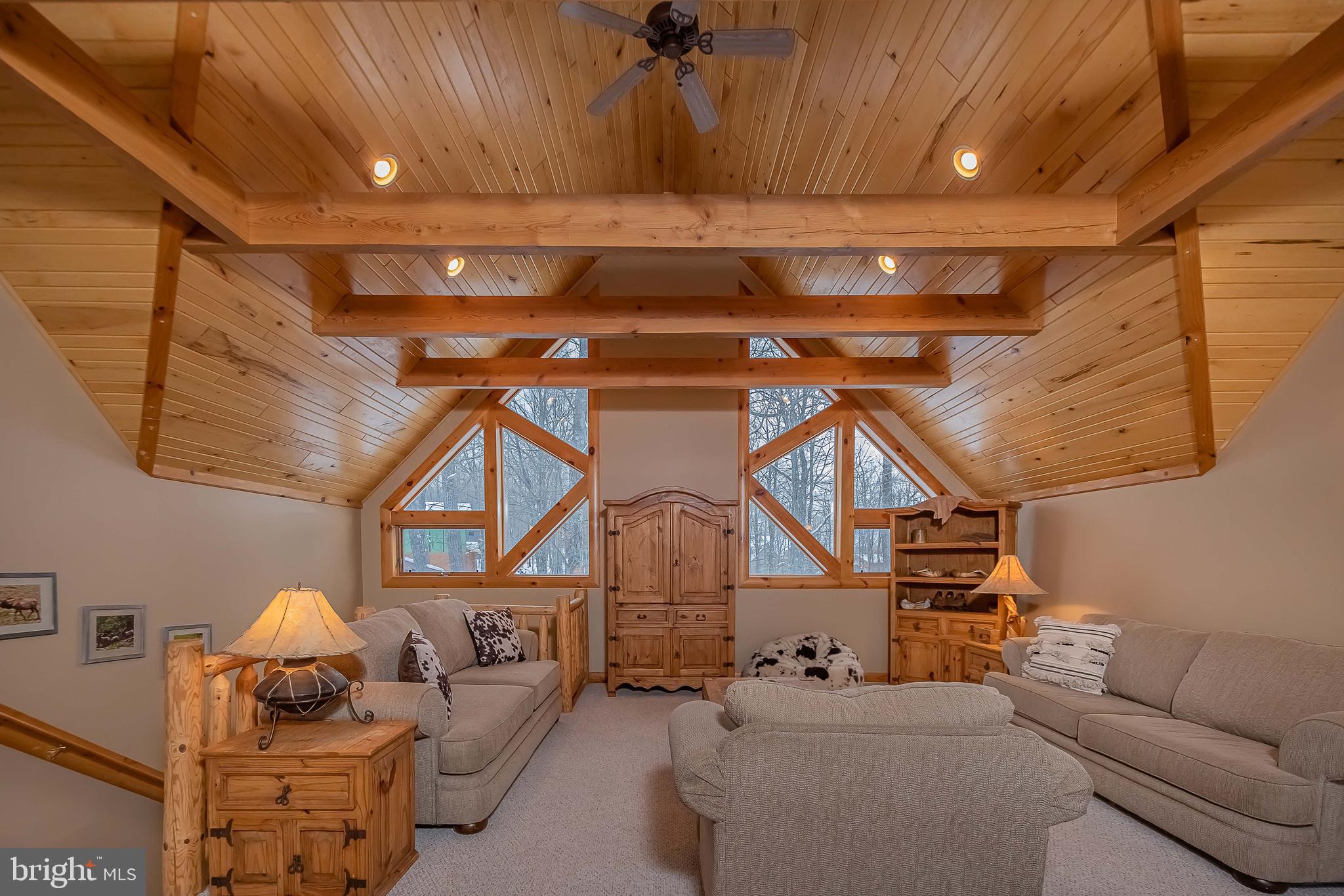 642 Deep Creek Highlands Road McHenry, MD 21541 - Photo 34 of 59 a living room with furniture