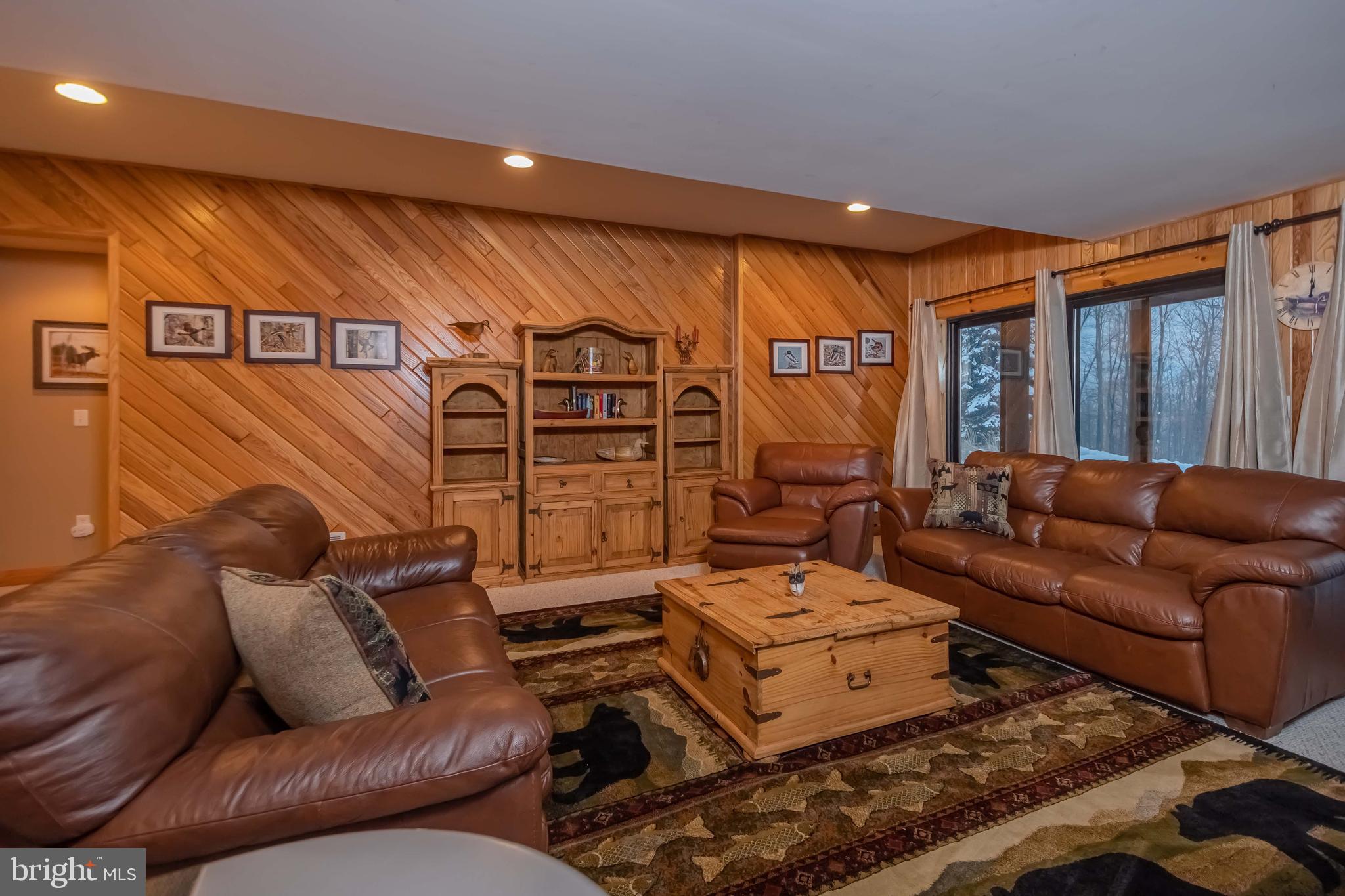 642 Deep Creek Highlands Road McHenry, MD 21541 - Photo 49 of 59 a living room with furniture