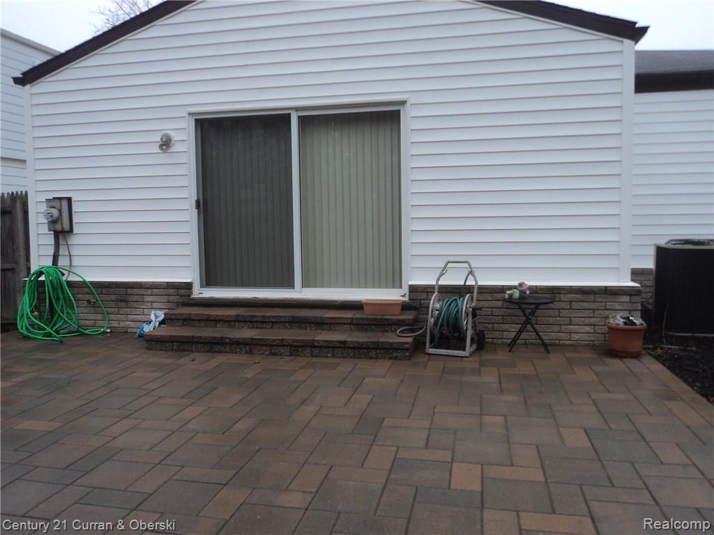 24289 Kings Pointe Novi, MI 48375 - Photo 4 of 18 BRICK PAVER PATIO VIEW.JPG