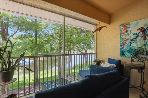 a balcony with furniture