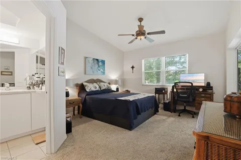 a bedroom with a bed and furniture