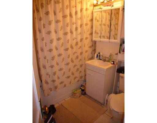 9 Colborne Road, Unit 18 Boston, MA 02135 - Photo 6 of 7 a bathroom with a sink and a toilet