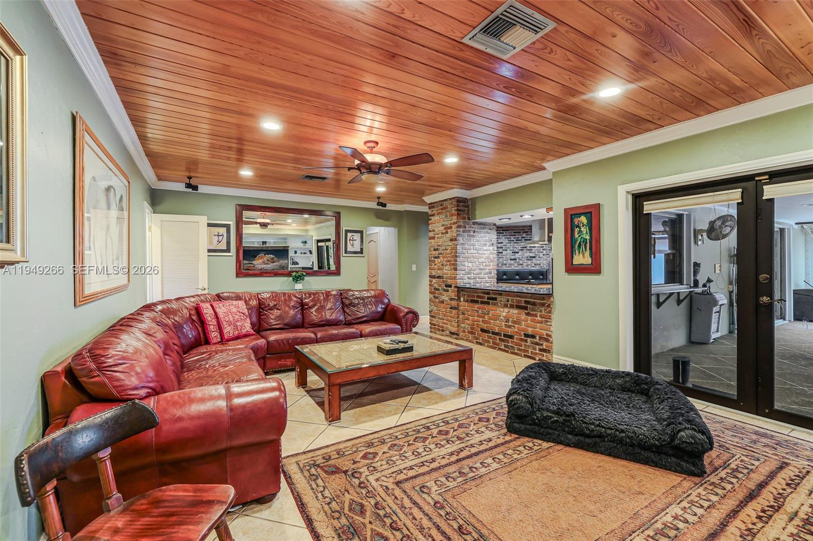 18975 Southwest 224th Street Miami, FL 33170 - Photo 26 of 97 a living room with furniture and a rug