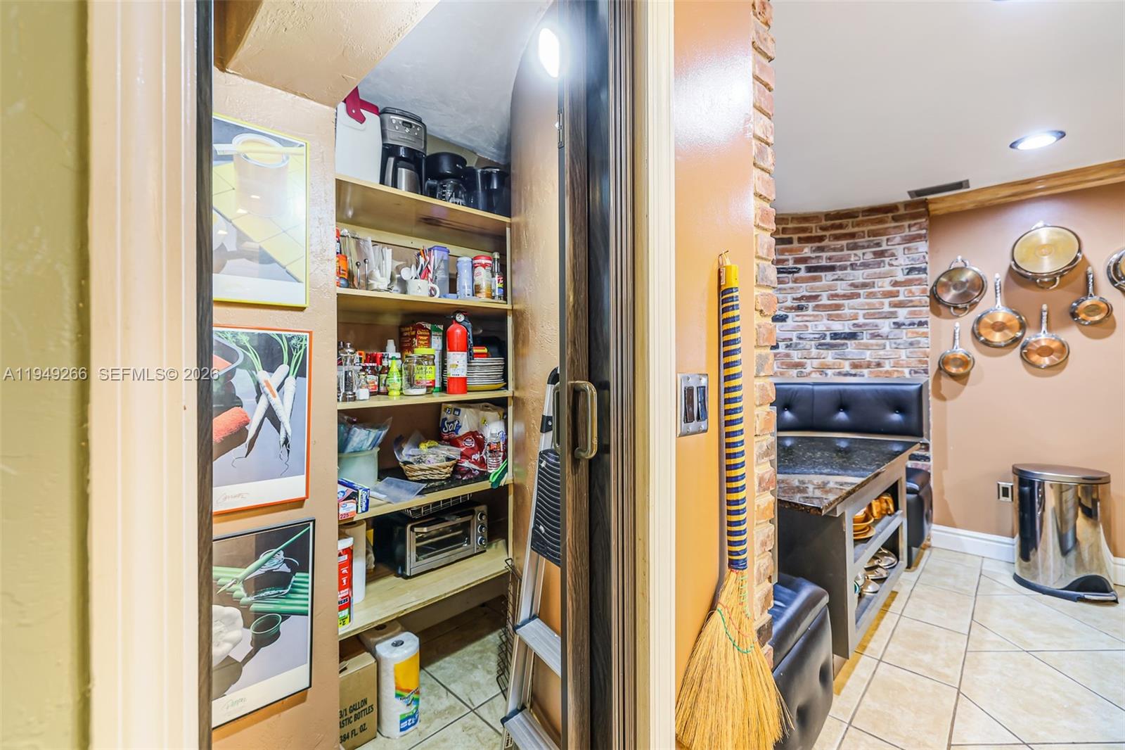 18975 Southwest 224th Street Miami, FL 33170 - Photo 33 of 97 a view of walk in closet with clothes and shoes
