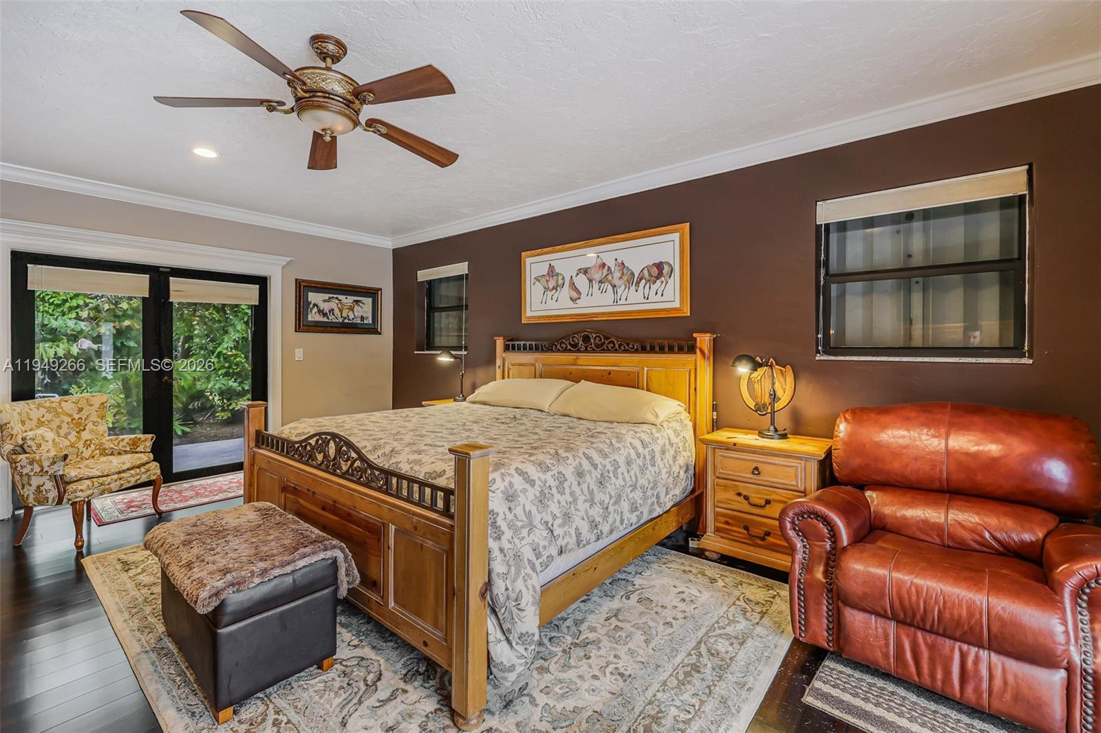 18975 Southwest 224th Street Miami, FL 33170 - Photo 41 of 97 a bedroom with a bed couch and window