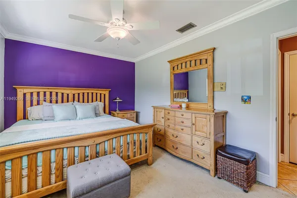 an aerial view of a residential houses with outdoor space