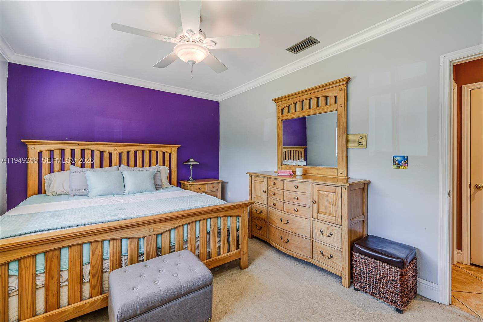 18975 Southwest 224th Street Miami, FL 33170 - Photo 46 of 97 a bedroom with a bed and a dresser in it