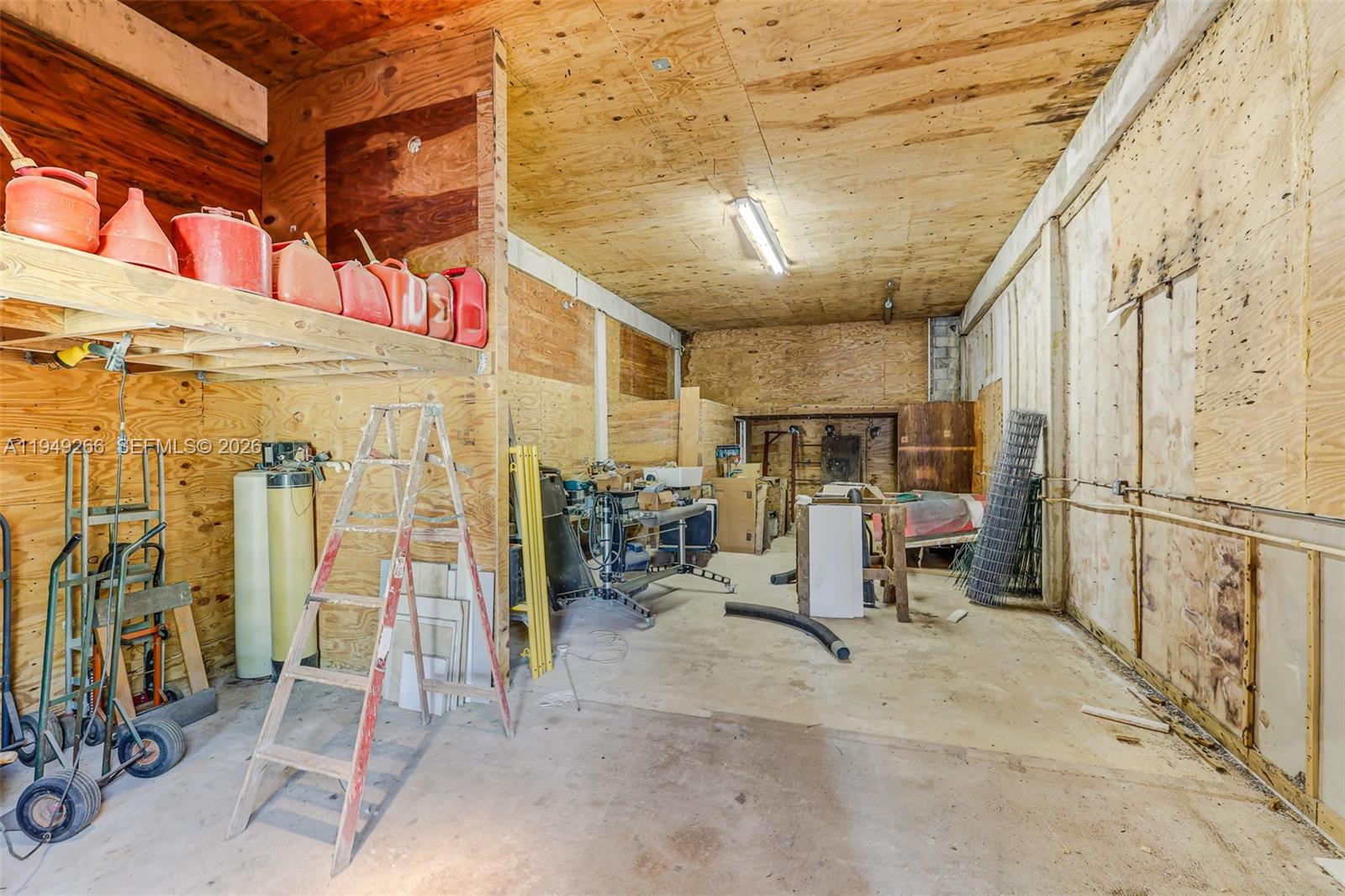 18975 Southwest 224th Street Miami, FL 33170 - Photo 70 of 97 a view of a room with gym equipment