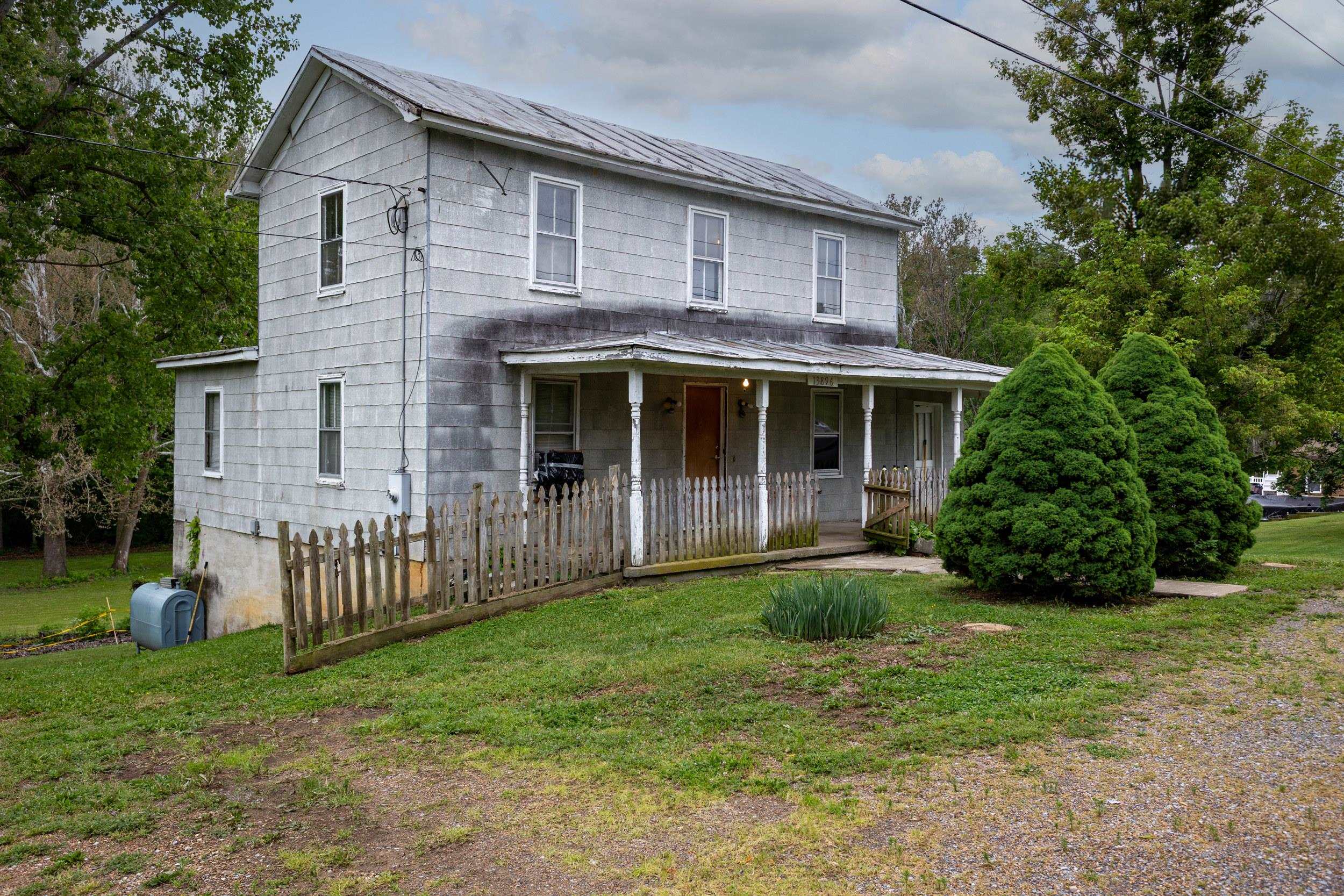 13896 Rockingham Pike Elkton, VA 22827 - Photo 53 of 60 a front view of a house with garden