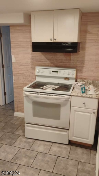 249 Summer Avenue Newark, NJ 07104 - Photo 10 of 16 a stove top oven sitting inside of a kitchen