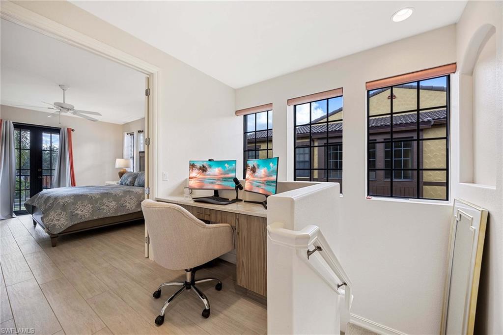 9076 Rialto Street, Unit 62 Naples, FL 34113 - Photo 20 of 50 a living room with furniture and a window