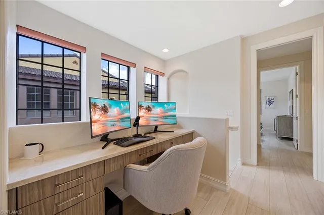 a dining room with furniture and window