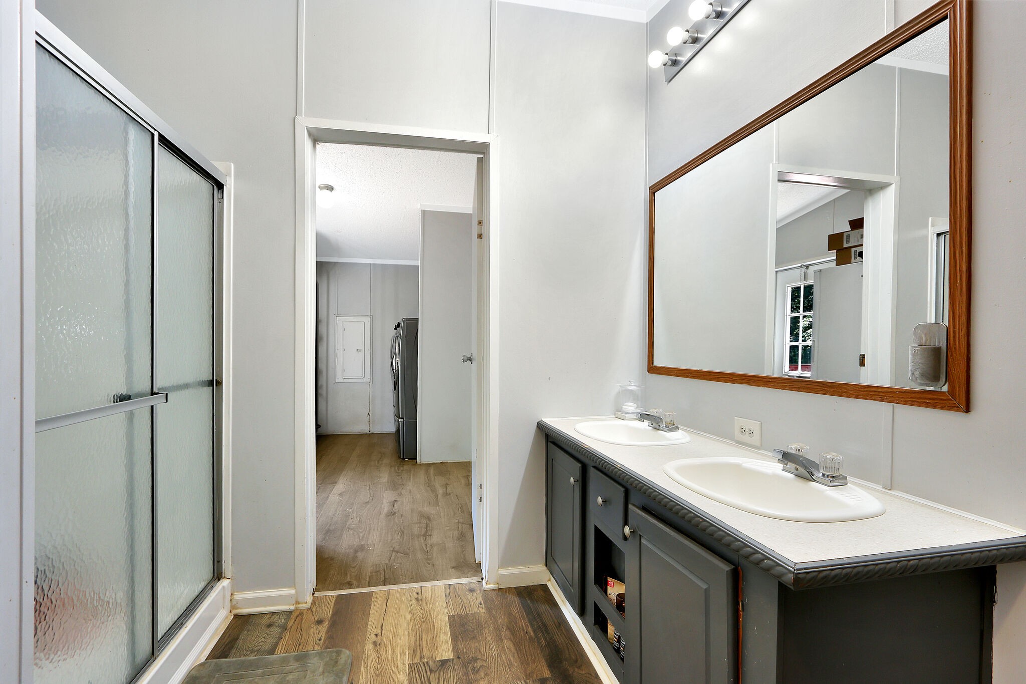 2218 Lee Road Spring Hill, TN 37174 - Photo 12 of 19 a bathroom with a sink and a mirror