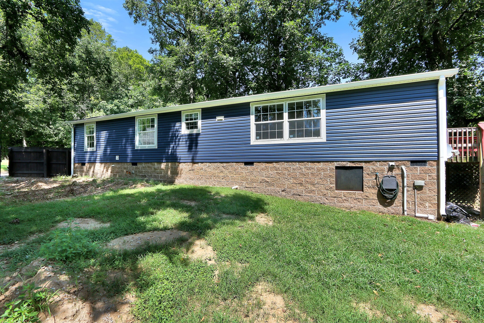 2218 Lee Road Spring Hill, TN 37174 - Photo 16 of 19 a backyard of a house with table and chairs