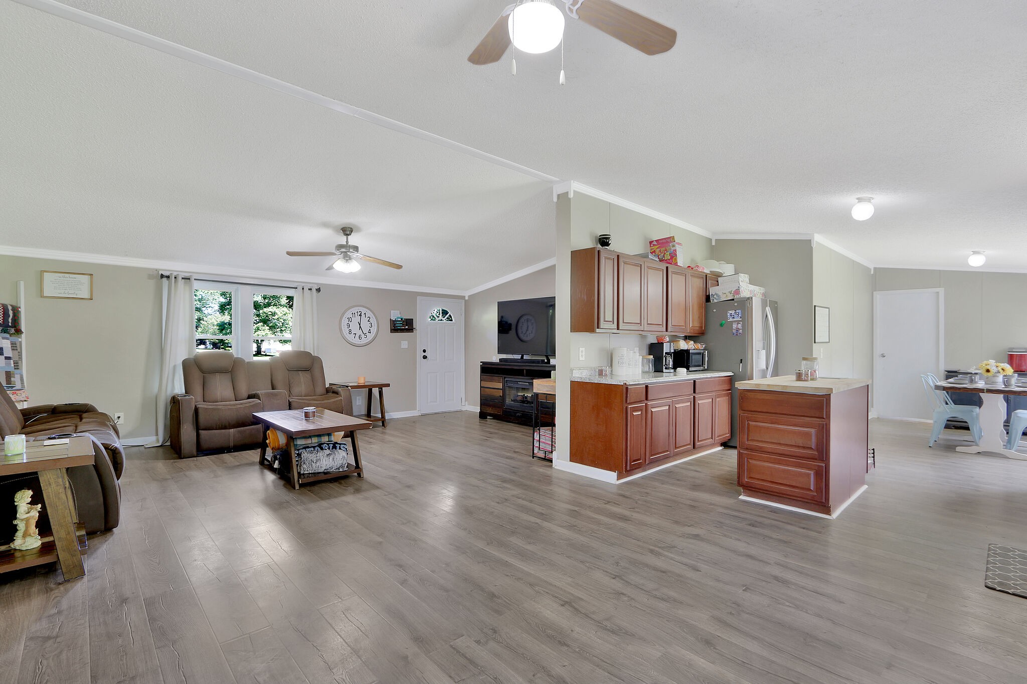 2218 Lee Road Spring Hill, TN 37174 - Photo 5 of 19 a living room with furniture kitchen view and a wooden floor